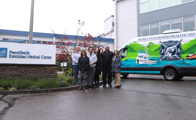 PeaceHealth Ketchikan Medical Center's Quality & Patient Safety team in front of  the City of Ketchikan’s Mobile Integrated Health (MIH) vehicle